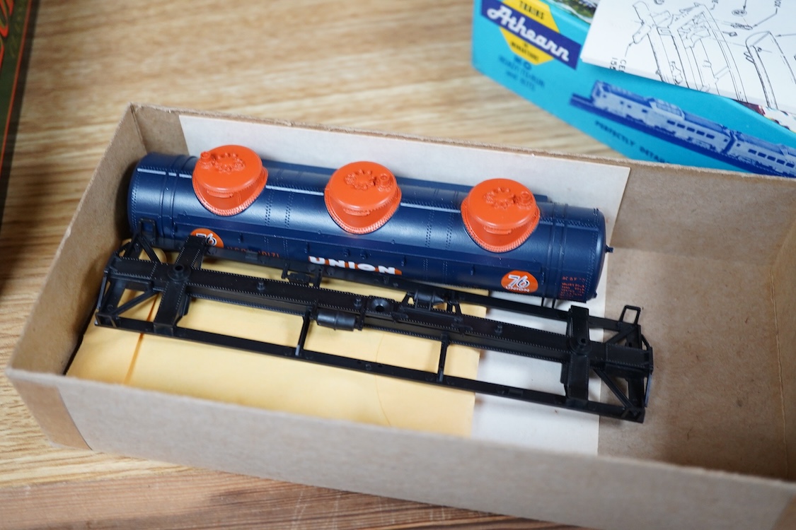 A quantity of US outline HO railway by Athearn, Bachmann, etc. including three locomotives; a Union Pacific Bo-Bo diesel, 1468, a Santa Fe Bo-Bo diesel, 5707, and a Santa Fe 0-4-0 tender engine, together with a 12-wheel